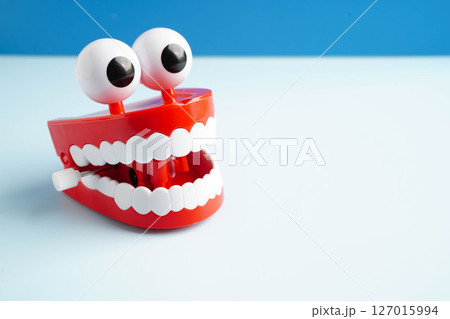 Funny red teeth with eye toy denture model for dental health care. Funny red teeth with eye toy denture model for dental health care. 127015994