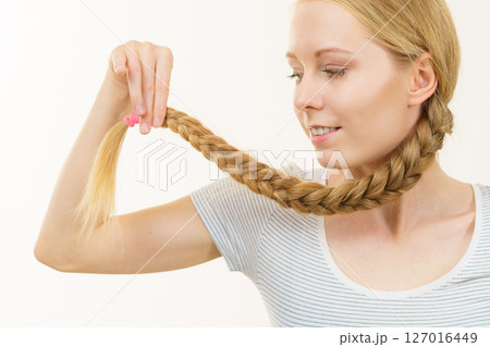 Blonde girl with braid hair Blonde girl with braid hair 127016449