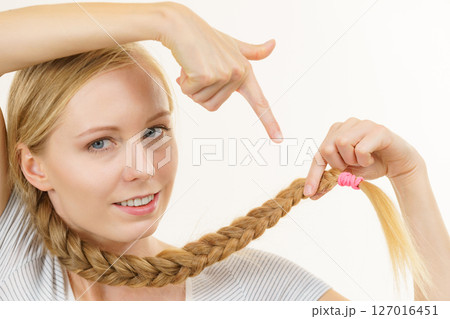 Blonde girl with braid hair 127016451