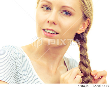 Blonde young woman with braid hair 127016455