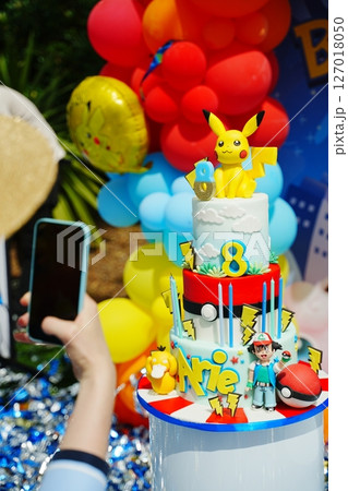 Capturing a Pokemon-Themed Birthday Cake with Smartphone 127018050