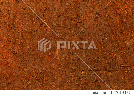 Rusty metal surface close-up, orange brown corrosion texture Rusty metal surface close-up, orange brown corrosion texture 127019377