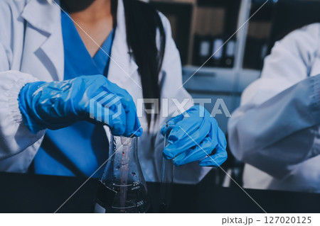 scientist working at the laboratory scientist working at the laboratory 127020125