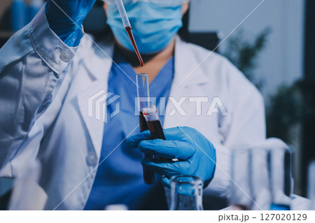scientist working at the laboratory scientist working at the laboratory 127020129