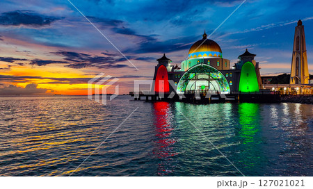 Bandar Melaka, Malaysia- April 16 2025.Masjid Selat Melaka is a landmark for tourist spot in Malacca.A landmark that attracts people to view the architecture landscape.The mosque is built on the sea. Bandar Melaka, Malaysia- April 16 2025.Masjid Selat Melaka is a landmark for tourist spot in Malacca.A landmark that attracts people to view the architecture landscape.The mosque is built on the sea. 127021021