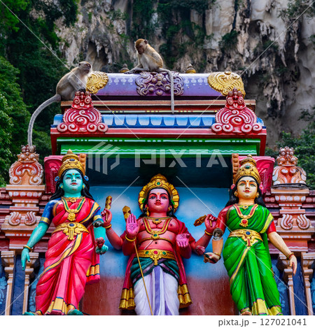 Gombak, Selangor Malaysia: April 18 2025: Batu Caves and the Murugan statue  (The Hindu god of war ) also known as Kartikeya , Skanda, Subrahmanya and Shanmukha. 127021041