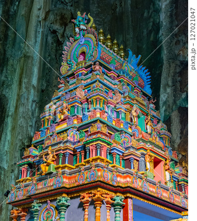 Gombak, Selangor Malaysia: April 18 2025: Batu Caves and the Murugan statue  (The Hindu god of war ) also known as Kartikeya , Skanda, Subrahmanya and Shanmukha. 127021047