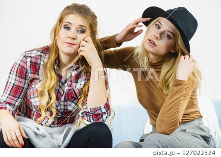 Two women being tired or bored 127022324