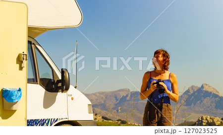 Woman travel with caravan, taking photo 127023525