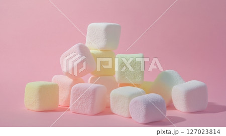 Pile of colorful marshmallows on pink background, soft texture. Sweet and playful concept 127023814