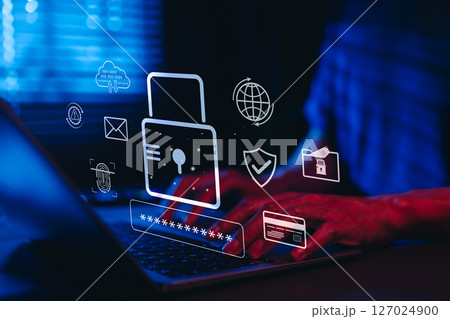 Cybersecurity and Data Protection Technology Concept. Hands typing on a laptop with a padlock icon and security symbols, representing data protection, cyber security, and secure online communication. 127024900