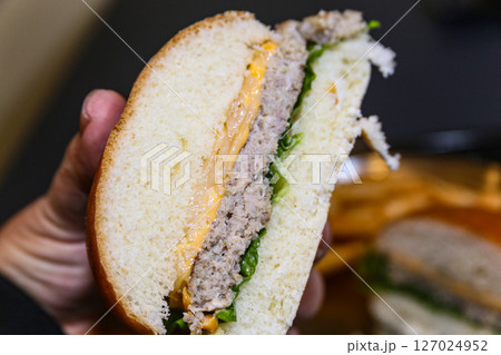 Homemade hamburger cut in half 127024952