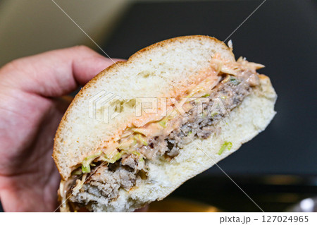 Homemade hamburger cut in half Homemade hamburger cut in half 127024965