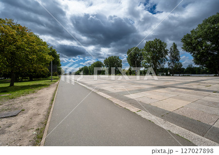 Nuremberg, Germany, August 3, 2023. View of Grosse Strasse in the Nazi party rally area. It is the long straight road where Nazi parades, travel destinations, took place. Nuremberg, Germany, August 3, 2023. View of Grosse Strasse in the Nazi party rally area. It is the long straight road where Nazi parades, travel destinations, took place. 127027898