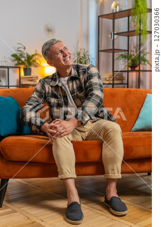 Caucasian man suffer from painful discomfort severe knee joint ache leg muscles knees illness cramps 127030366