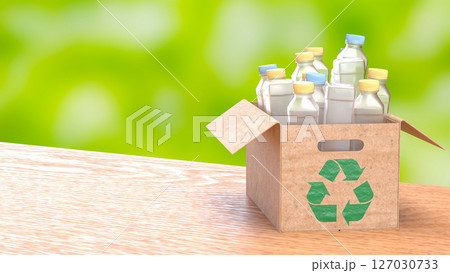 The Plastic bottle in Paper Box for eco or recycle concept 3d Rendering. The Plastic bottle in Paper Box for eco or recycle concept 3d Rendering. 127030733
