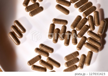Drug pills on a tray 127031423