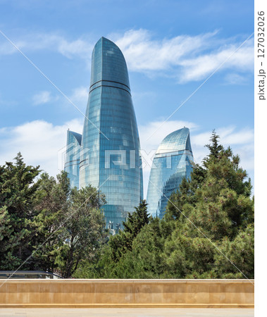 View from Martyrs Lane of the iconic Flame Towers in Baku, Azerbaijan stand tall against a blue sky, resembling flames 127032026