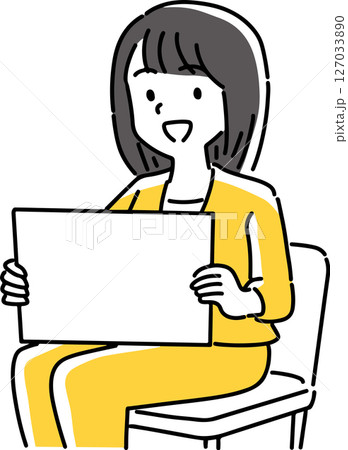 座ってボードを見せる女性 座ってボードを見せる女性 127033890