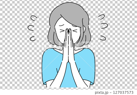 手を合わせて申し訳なさそうに頭を下げている若い女性 127037573