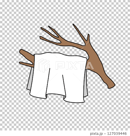 A white towel is hanging on a tree branch A white towel is hanging on a tree branch 127039446