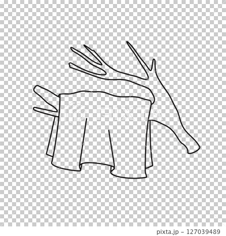 A white background with a tree branch and a piece of cloth A white background with a tree branch and a piece of cloth 127039489