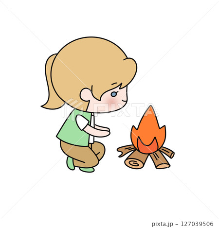A girl is sitting next to a fire A girl is sitting next to a fire 127039506