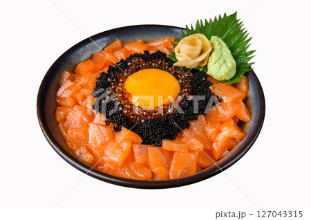Salmon Sashimi Donburi with Ikura, Caviar, and Raw Egg Yolk Salmon Sashimi Donburi with Ikura, Caviar, and Raw Egg Yolk 127043315