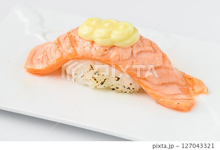 Grilled Salmon Nigiri Sushi Topped with Creamy Mayonnaise Sauce Grilled Salmon Nigiri Sushi Topped with Creamy Mayonnaise Sauce 127043321