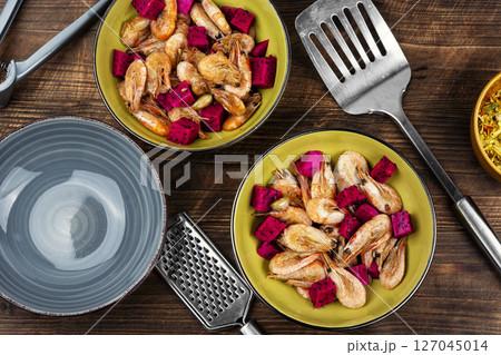 Shrimp cooked in a fruit marinade. Shrimp cooked in a fruit marinade. 127045014