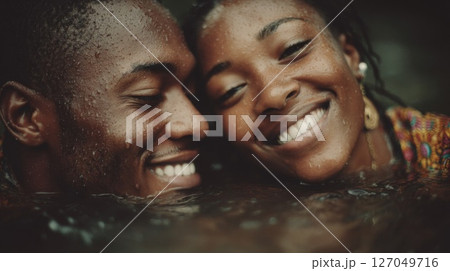 Smiling Couple Embracing in Water 127049716
