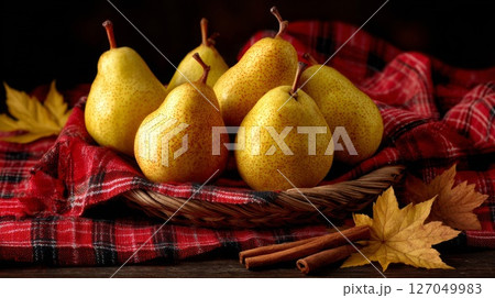 Yellow Pears in Rustic Basket with Autumnal Decor 127049983