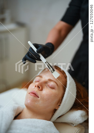 Skincare treatment session in a tranquil salon environment 127050046