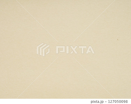 Whispers of cream and ecru dance across the unblemished expanse of this minimalist beige paper backdrop Whispers of cream and ecru dance across the unblemished expanse of this minimalist beige paper backdrop 127050098