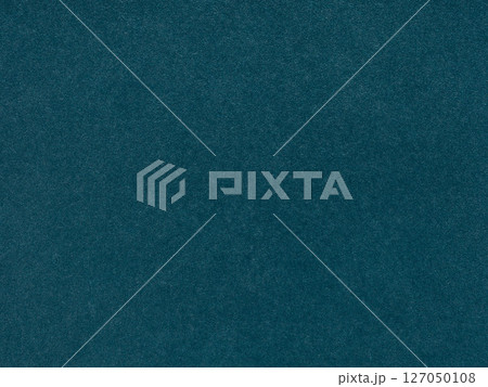 A serene expanse of cobalt whispers tranquility in this textured blue paper close-up 127050108