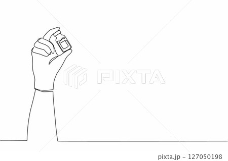 Single one line drawing doctor's hand holding medicine bottle with vaccine for coronavirus. Virus protection. Covid-19 vaccination with vaccine bottle. Continuous line draw design vector illustration 127050198
