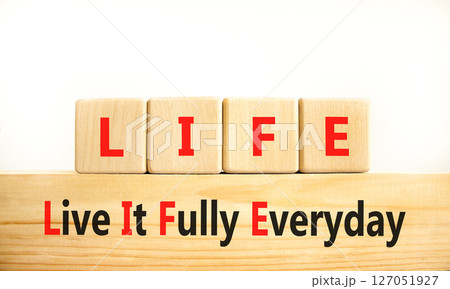 LIFE live it fully everyday symbol. Concept word LIFE Live It Fully Everyday on beautiful blocks. Beautiful white background. Business motivational LIFE live it fully everyday concept. Copy space. LIFE live it fully everyday symbol. Concept word LIFE Live It Fully Everyday on beautiful blocks. Beautiful white background. Business motivational LIFE live it fully everyday concept. Copy space. 127051927