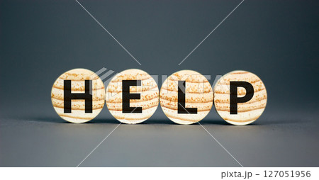 Help symbol. Concept word Help on beautiful wooden circles. Beautiful grey table grey background. Business, lifestyle, support and help concept. Copy space. Help symbol. Concept word Help on beautiful wooden circles. Beautiful grey table grey background. Business, lifestyle, support and help concept. Copy space. 127051956