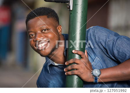 close-up of young african, smiling. close-up of young african, smiling. 127051992