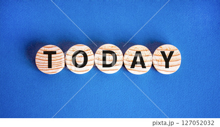Today symbol. Concept word Today on beautiful wooden circles. Beautiful blue table blue background. Business lifestyle today concept. Copy space. Today symbol. Concept word Today on beautiful wooden circles. Beautiful blue table blue background. Business lifestyle today concept. Copy space. 127052032