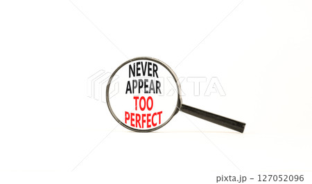Never appear too perfect symbol. Concept words Never appear too perfect on beautiful magnifying glass. Beautiful white table white background. Business and never appear too perfect concept. Copy space Never appear too perfect symbol. Concept words Never appear too perfect on beautiful magnifying glass. Beautiful white table white background. Business and never appear too perfect concept. Copy space 127052096