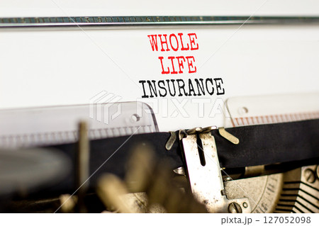 Whole life insurance symbol. Concept words Whole life insurance typed on beautiful old retro vintage typewriter. Beautiful white background. Business whole life insurance concept. Copy space. 127052098