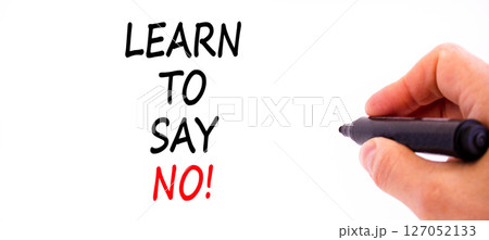 Learn to say no symbol. Concept words phrase Learn to say no on beautiful white paper. Businessman's hand. Beautiful white background. Business psychological Learn to say no concept. Copy space. 127052133