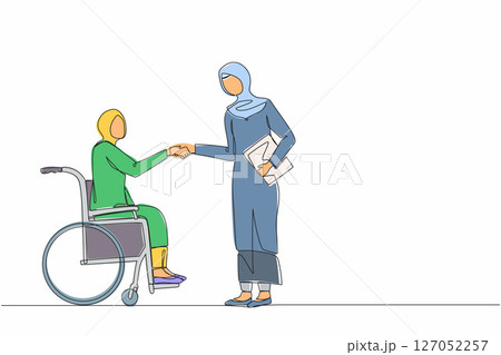Single continuous line drawing disabled Arabian businesswoman in wheelchair shaking hand with business partner. Disability manager dialogue with business colleague. One line draw graphic design vector 127052257