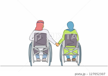 Single continuous line drawing back view of disabled people on wheelchair living happy active lifestyle. Disabled Arab couple man woman in wheelchair sitting and holding hands. One line design vector 127052307