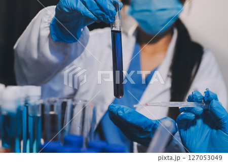 scientist working at the laboratory scientist working at the laboratory 127053049