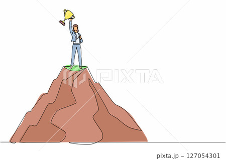 Single one line drawing success on top. Businesswoman on top of mountain holding trophy in raised hands. Winner, happiness, reaching goal concept. Continuous line design graphic vector illustration 127054301