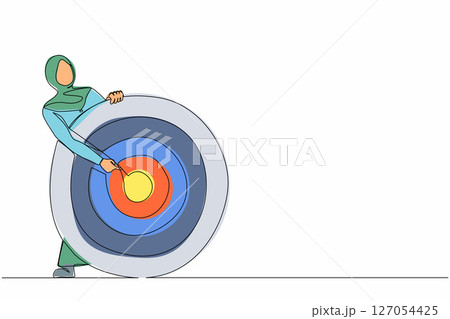 Single one line drawing Arabian businesswoman holding archer target or dashboard pointing at bullseye. Focus on business target, setting goal for motivation. Continuous line draw design graphic vector 127054425