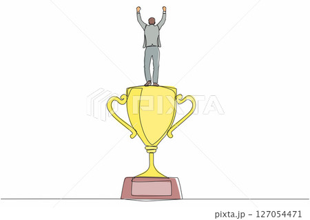 Single one line drawing back view businessman stand above trophy. Business metaphor of success and appreciation. Young male celebrating his business award. Continuous line draw design graphic vector 127054471