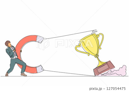 Single continuous line drawing businessman attracting big trophy with huge magnet. Victory sign. Success, achievement, business goals concept. Dynamic one line draw graphic design vector illustration 127054475